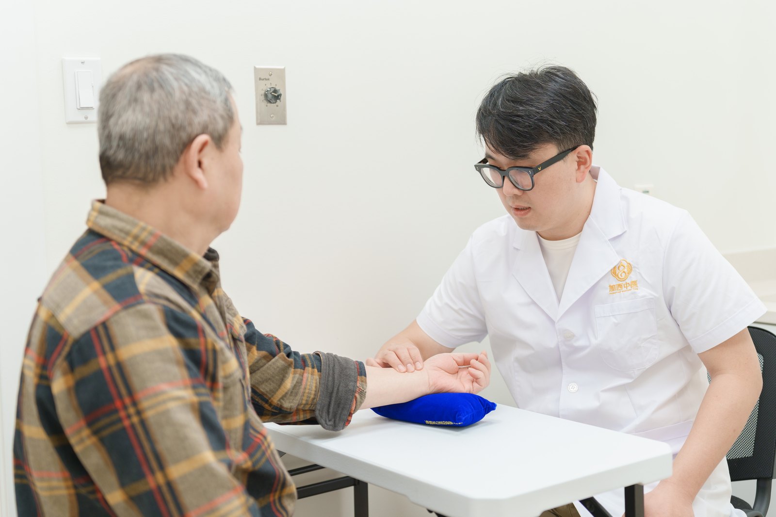 Pulse diagnosis during consultation at White Rock clinic